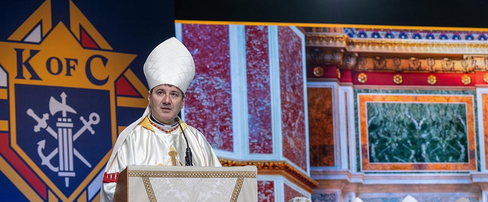 Cardinal Frank Leo, archbishop of Toronto, delivers the homily during Mass for the feast of the Transfiguration of the Lord on Aug. 6, the second day of the 143rd Supreme Convention.