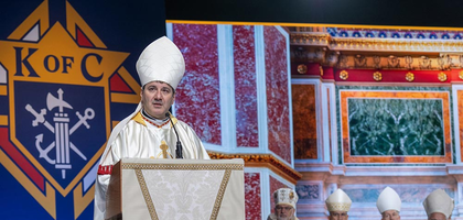 Cardinal Frank Leo, archbishop of Toronto, delivers the homily during Mass for the feast of the Transfiguration of the Lord on Aug. 6, the second day of the 143rd Supreme Convention.
