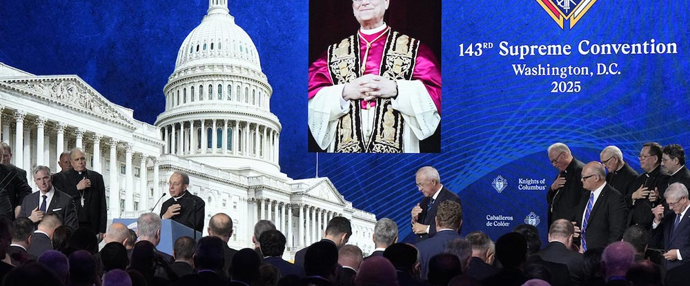 Supreme Chaplain Archbishop William Lori of Baltimore leads a prayer for Pope Leo XIV at the conclusion of the opening business session of the 143rd Supreme Convention on Aug. 5 in Washington, D.C.