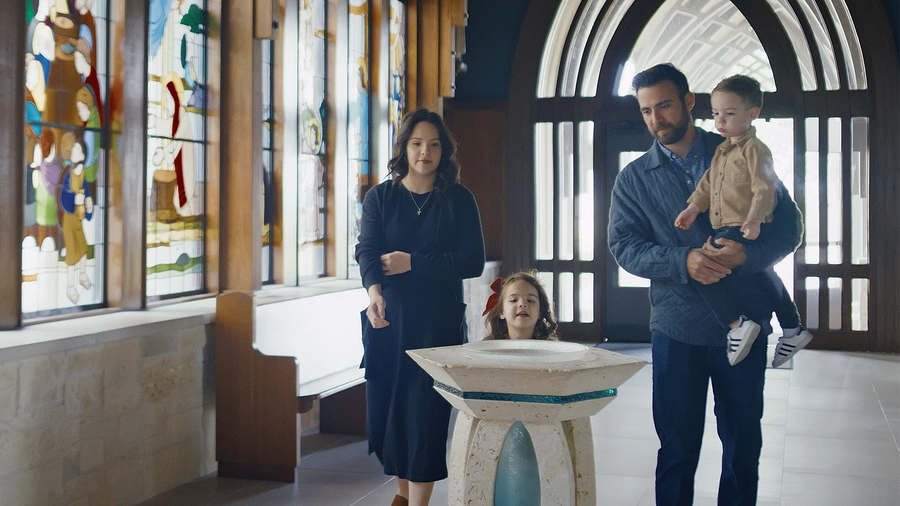 A family in a church entrance
