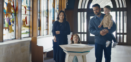 A family in a church entrance