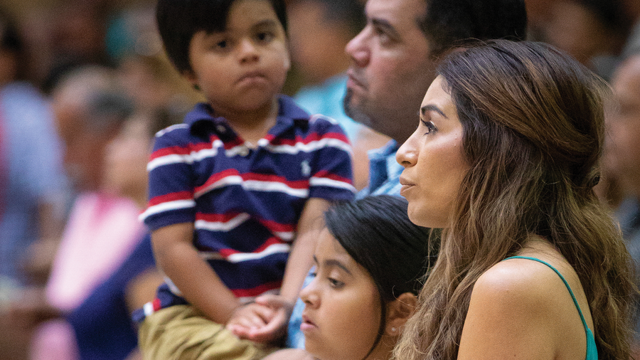 People watching something