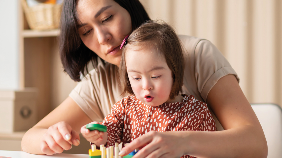 Woman playing with her child