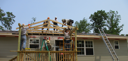 Knights from Father Vincent S. Sikora Council 7992 in Burke, Va., and parishioners from Nativity Catholic Church build a house in McCreary County, Ky., for a family of three during a homebuilding mission trip in Appalachia. This was the 27th house completed by Council 7992 in partnership with the Appalachian Construction Crew since 2001.