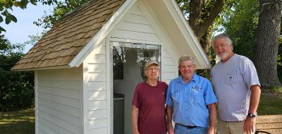 Members of Father Al Hietpas Council 6764 in Suamico, Wis., gather in front of the St. Therese Roadside Chapel at the National Shrine of Our Lady of Champion after a recent council service day. The Knights’ work included power washing the exterior siding, cleaning the chapel, and applying two coats of paint. The council also contracted a roof cleaning service to remove mold from the rooftop. Funds for the project were donated by individual Knights.