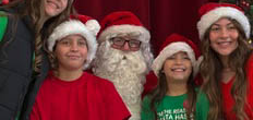 Past Grand Knight Bill Hewitt of Aldo J. Zazzi Council 6992 in Kingsport, Tenn., dressed as Santa, takes a photo with students from St. Dominic School during the annual Breakfast with Santa sponsored by the council and the school’s Parent-Teacher Organization. The event drew about 150 people, who enjoyed a pancake breakfast, crafts and a visit with Santa.
