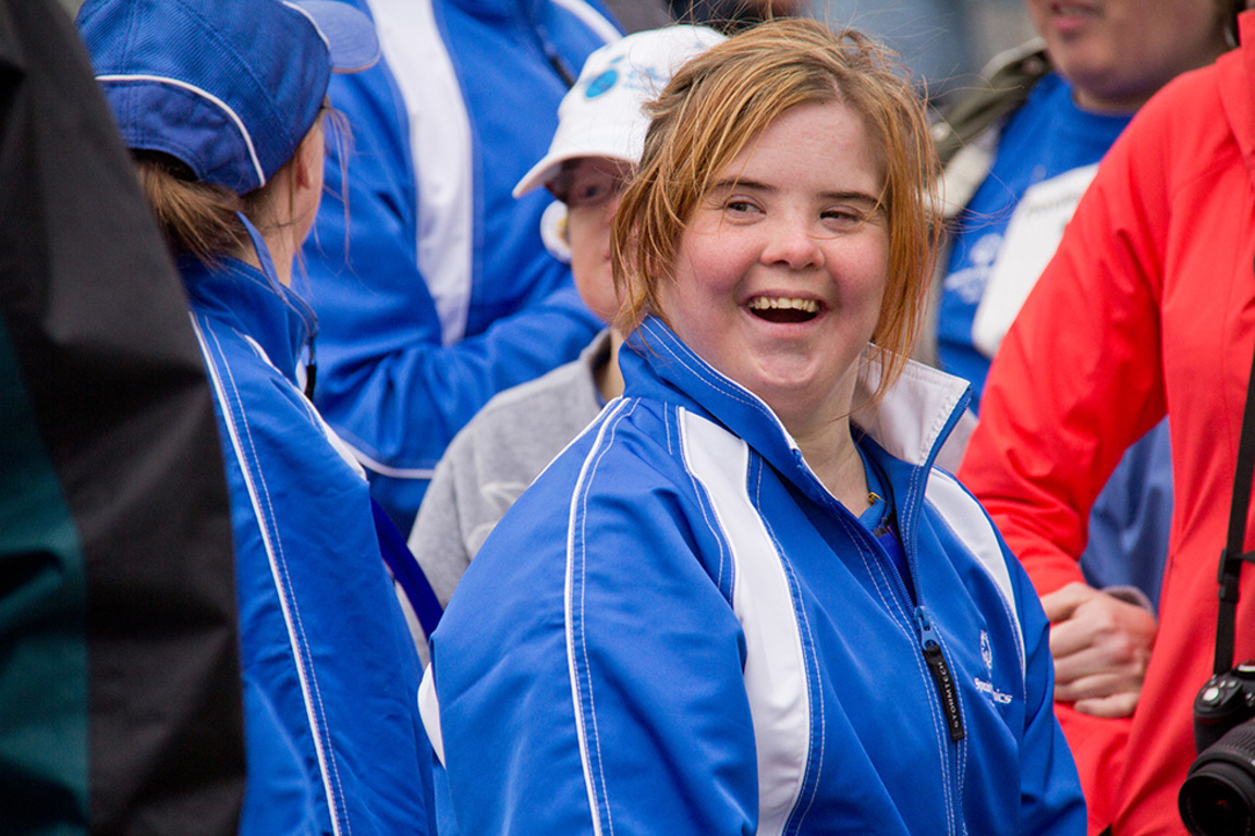 A special Olympics athlete facing the camera.