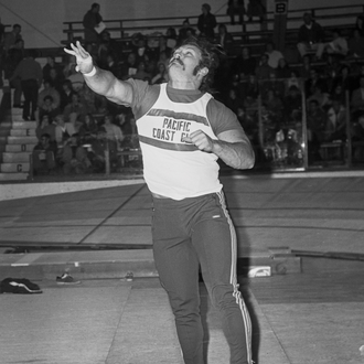 American Al Feuerbach releases a shot put at the 1971 K of C Saskatoon Indoor Games.