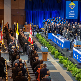 Fourth Degree Knights from the Champlain Province present the colors of Canada, the Holy See and the United States as the Aug. 6 business session of the 142nd Supreme Convention begins in Québec City.