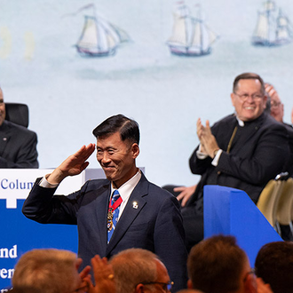 Gen. Shin Kyoung-Soo, territorial deputy of South Korea, salutes as he is acknowledged during the Aug. 6 business session of the 142nd Supreme Convention in Québec City. South Korea celebrates its 10th anniversary as a Knights of Columbus jurisdiction this year.