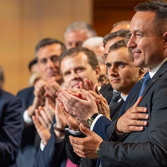 Youriy Maletskiy, past state deputy of Ukraine, receives a standing ovation for his leadership of the jurisdiction in wartime during the Aug. 6 business session of the 142nd Supreme Convention in Québec City.