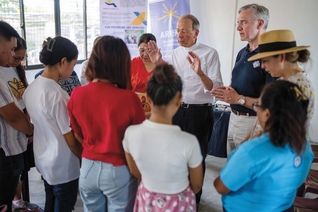 Archbishop William Lori blesses survivors of human trafficking.