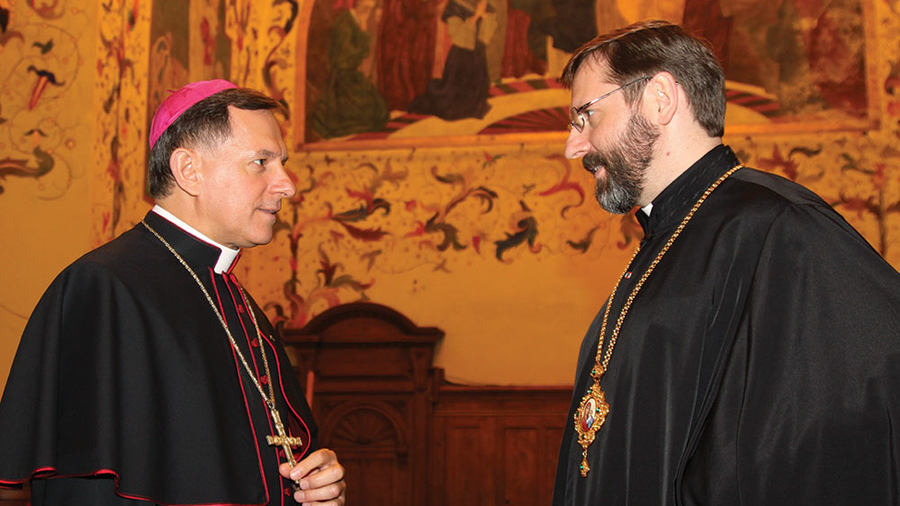 rchbishop Mieczysław Mokrzycki of Lviv talks with Major Archbishop Sviatoslav Shevchuk.