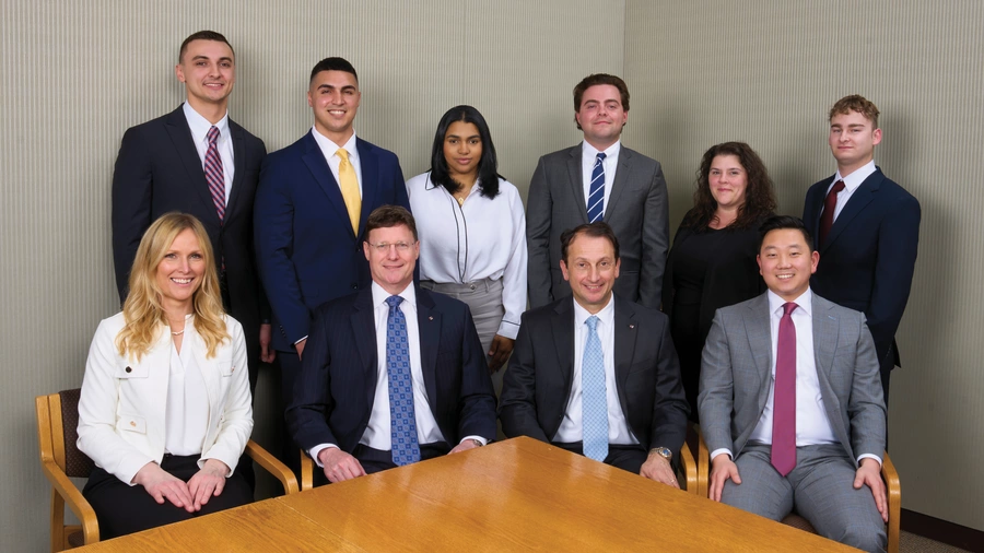 Members of the Knights of Columbus investment management and support team