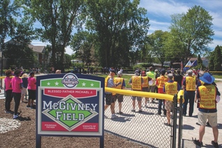 Knights from Michigan councils join athletes from Clinton Valley Little League Challenger Division Senior League for the dedication of Blessed Michael McGivney Field.