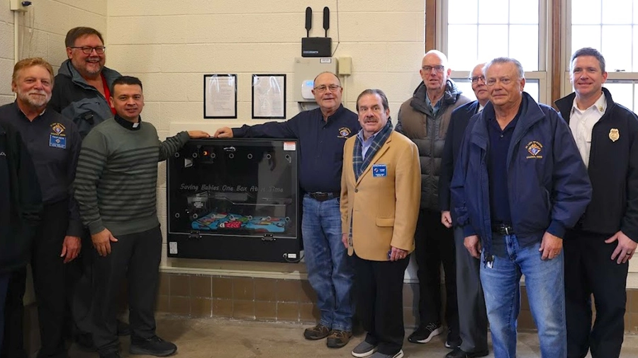 Wisconsin Knights of Columbus stand beside a Safe Haven Baby Box