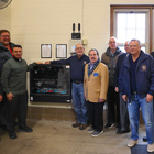 Wisconsin Knights of Columbus stand beside a Safe Haven Baby Box