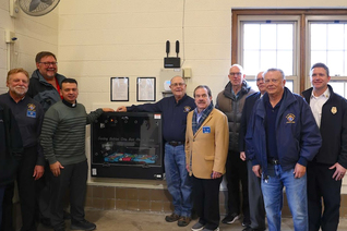 Wisconsin Knights of Columbus stand beside a Safe Haven Baby Box