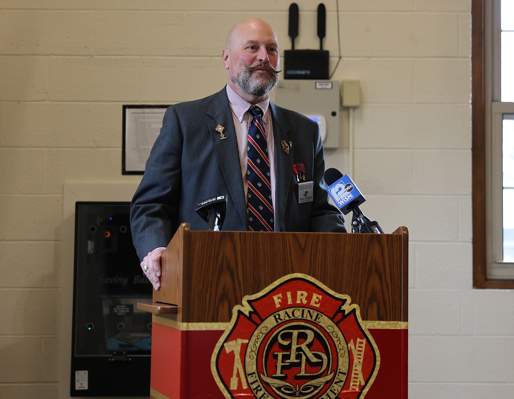 Wisconsin State Secretary Ross Larson offers remarks.