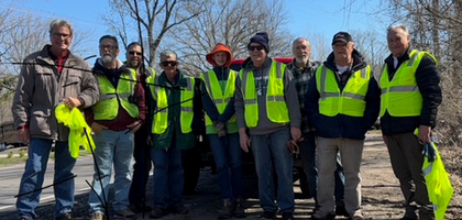 Members of Bishop Kevin M. Britt Council 13526 in Belmont, Mich., assemble to pick up debris along a 5-mile stretch of Rogue River Road as part of the Adopt-a-Road program.