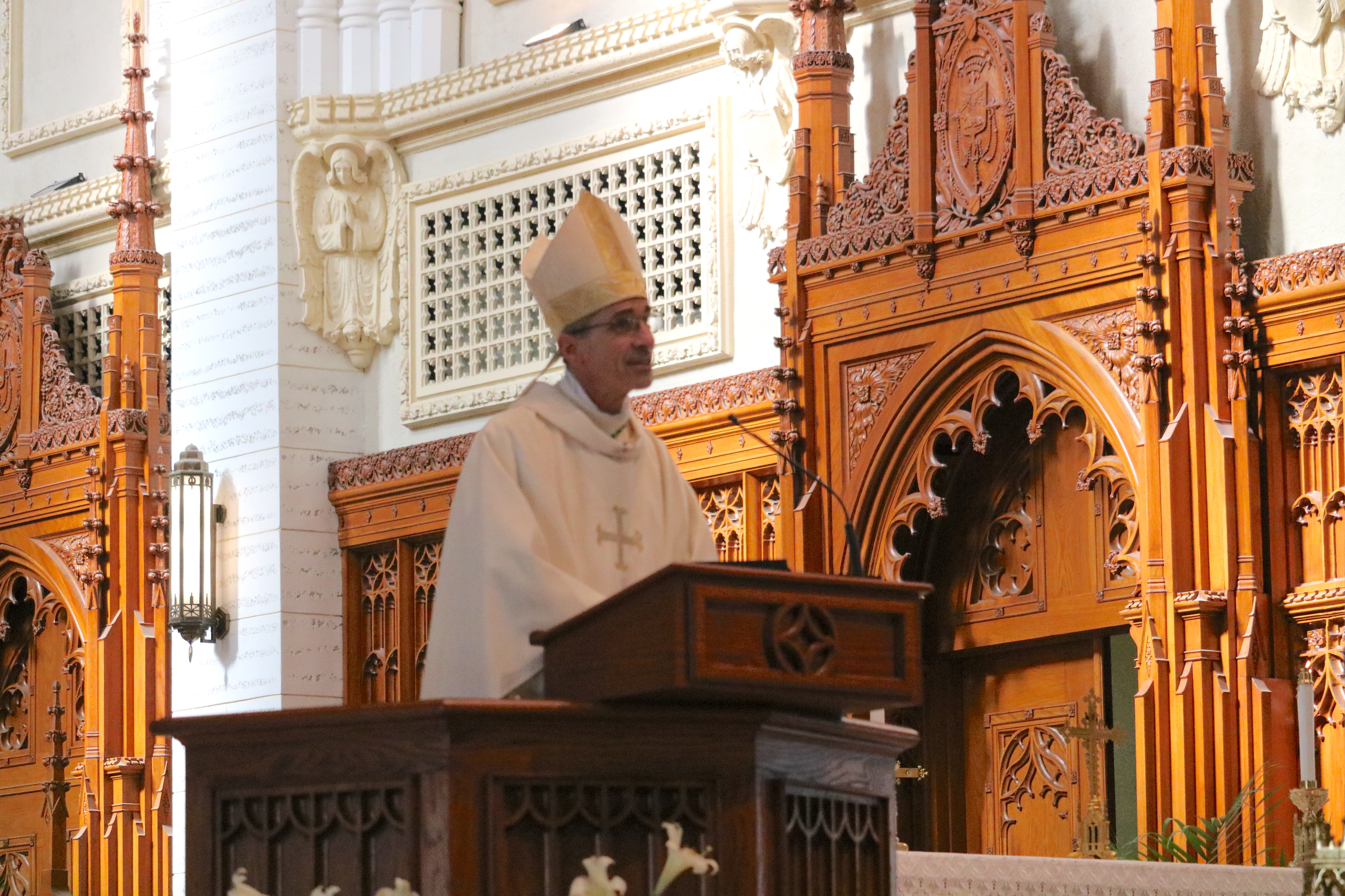Bishop James T. Ruggieri delivers the homily during Mass at the Cathedral of the Immaculate Conception in Portland, Maine.