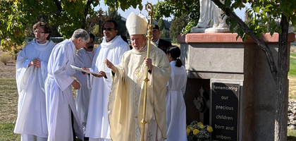 Bishop Liam Carey of Baker, Ore., speaks during a ceremony rededicating the memorial to the unborn at St. Francis of Assisi Church in Bend.