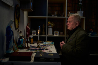 Bronislav Futomskyi, past grand knight of St. Charbel Council 16417, prays in his home in Khmelnytskyi, Ukraine.