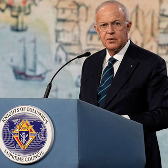 Past Supreme Knight Carl Anderson addresses the Aug. 7 business session