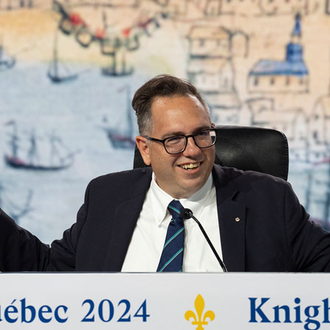 Supreme Secretary Patrick Mason gestures during the Aug. 7 business session