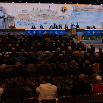 Supreme Advocate John Marrella reads proposed resolutions during the closing business session