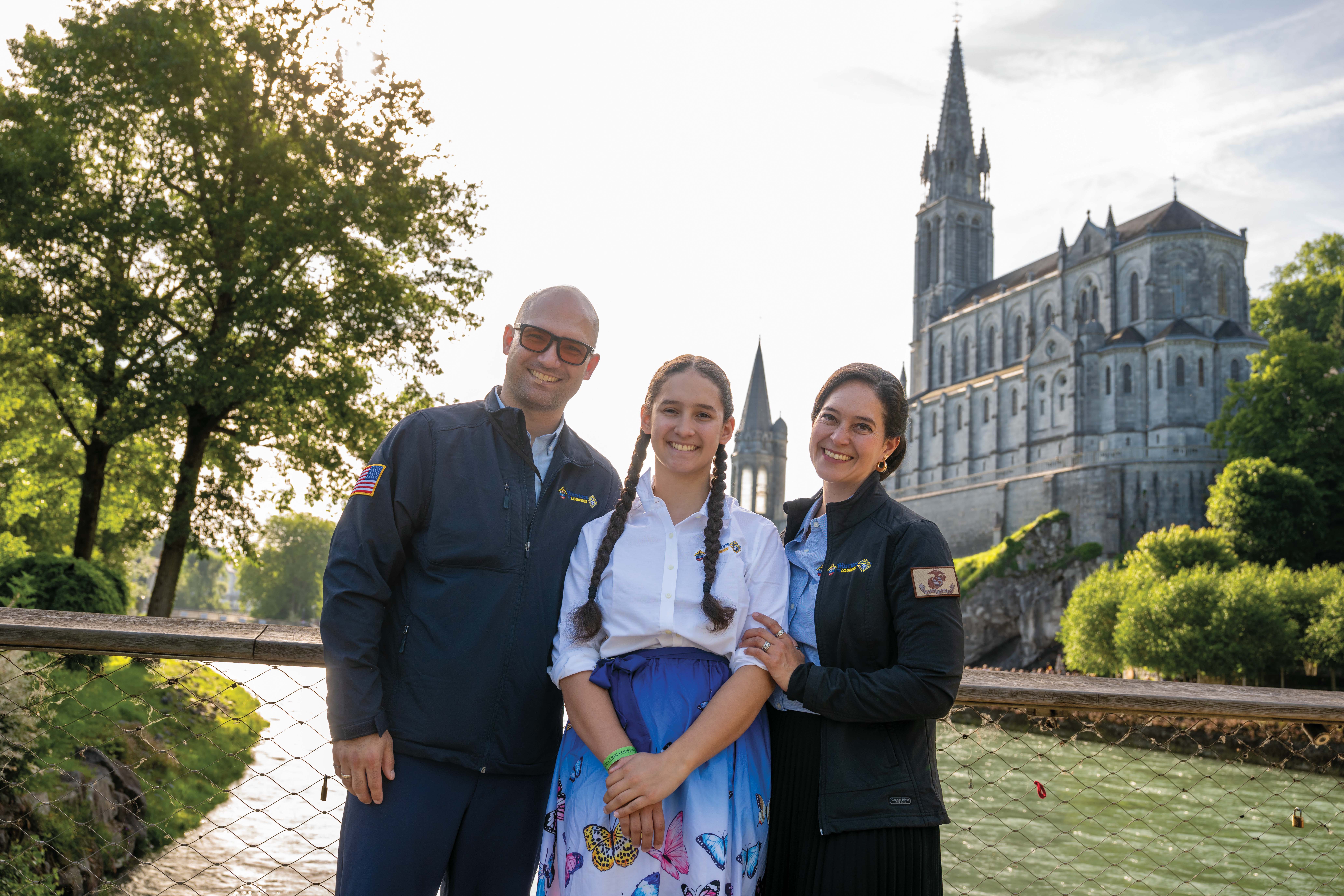 Retired U.S. Marine Corps Sgt. Buster Miscusi and his wife and daughter participate in Warriors to Lourdes in May