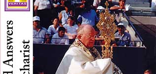 a monstrance being held up during an outside service