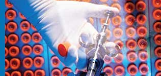 A medical syringe against a backdrop of medical tubes and a woman's face.