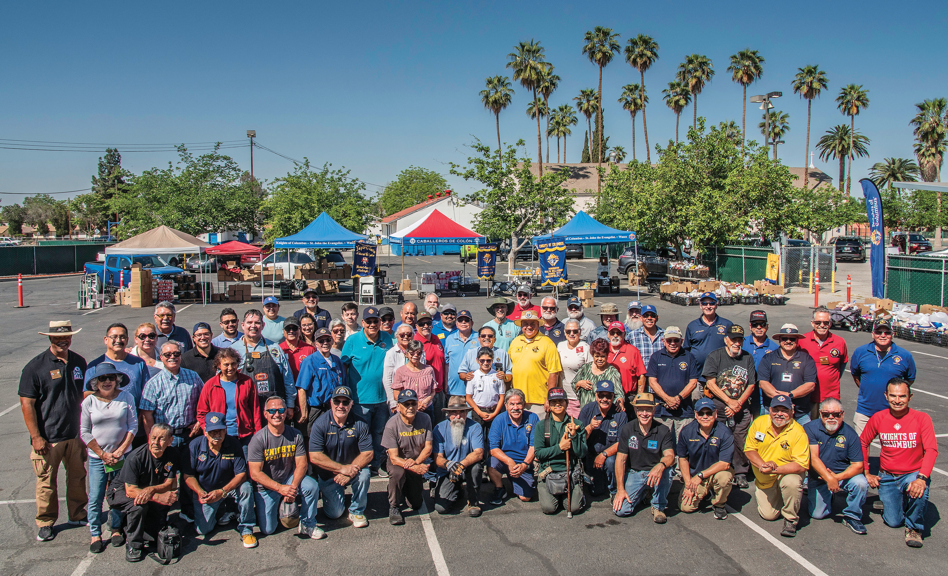 Knights and volunteers representing councils from the Kern/Inyo Chapter in the Diocese of Fresno assemble before the Campesinos distribution in Bakersfield.