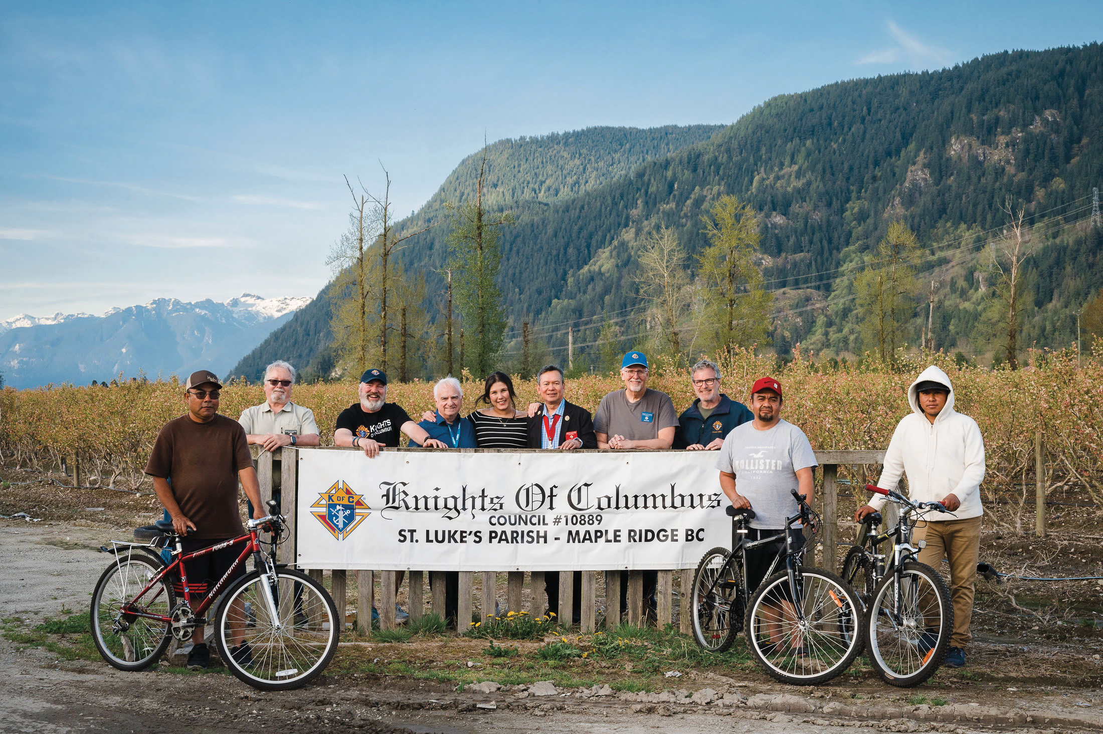 Knights from Our Lady of the Valley Council 10889 in Maple Ridge, British Columbia, deliver refurbished bicycles to migrant workers at a local farm. 