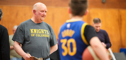 Deputy Grand Knight Garry Parsons of Archbishop Howley Council 2581 in Corner Brook, Newfoundland and Labrador, keeps score during the council’s recent Knights of Columbus Free Throw Championship.
