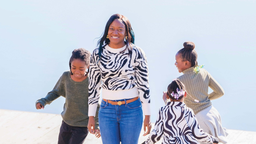 Chana Gaskins and her three children enjoy some time playing outside.