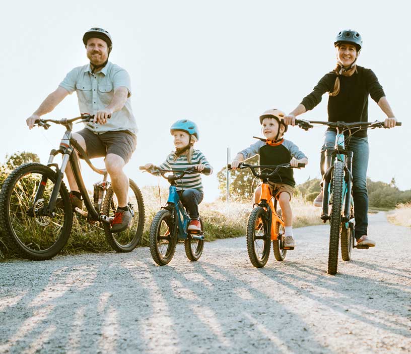A family riding bikes together.