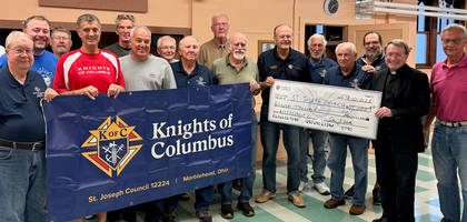 Knights from St. Joseph Council 12224 in Marblehead, Ohio, present an $11,000 check — funds from a recent fundraiser — to Father Joseph Szybka, pastor of St. Joseph Church. The funds will support the parish’s accessibility project, which will assist parishioners with mobility issues to navigate the parish campus.