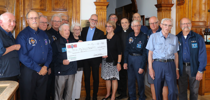 Knights from Ancienne Lorette (Québec) Council 4246 present a check for CA$100,000 — proceeds from the sale of the council’s home corporation building — to priests and parish council members of Notre-Dame-de-L’Annonciation Church to support renovation projects at the church, which was built in 1907. The updates include new flooring, new electrical and sound systems, window repairs, painting and more.