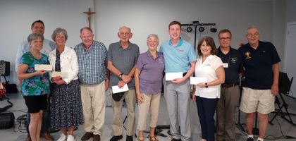Members of Holy Family Council 6099 in Chattanooga, Tenn., present checks totaling over $5,600 to representatives of several local organizations, including Choices, a pregnancy resource center; Orange Grove Center, which provides services to children and adults with disabilities; Special Olympics Tennessee; and more. The funds came from the council’s annual pro-life barbecue dinner and other fundraisers. 