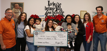 Knights from the Orange (Calif.) County Chapter present a check for $2,500 to staff and clients from the Diocese of Orange’s Walking with Moms in Need ministry. 