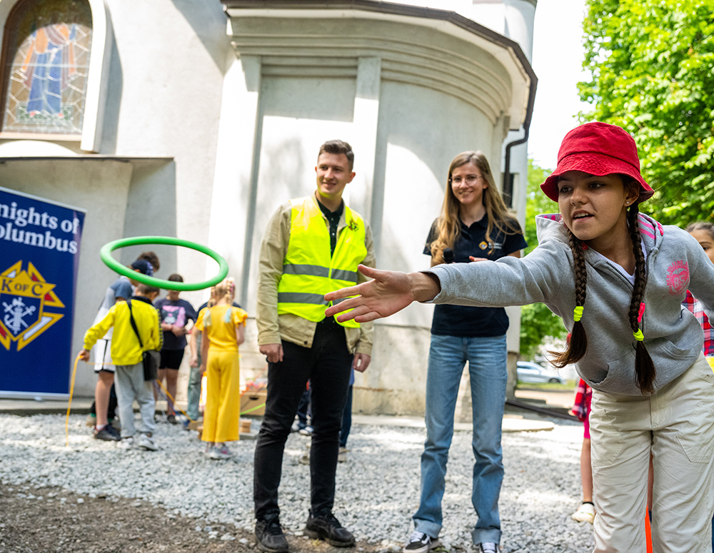 Child Plays Ring Toss