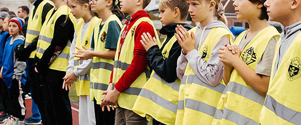 Children competing in the Knights of Columbus Cup in Ivano-Frankivsk on Oct. 5 say a prayer before the games begin.