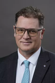 Portrait of Christopher Huesman.