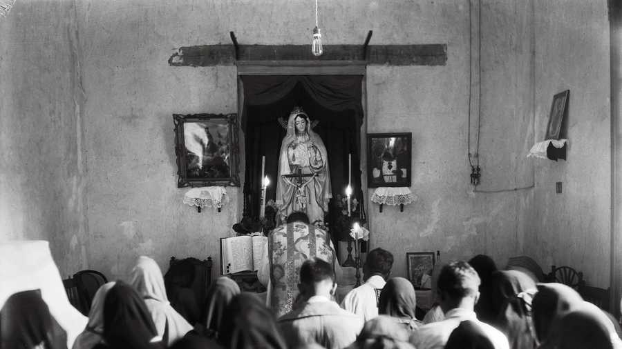 A clandestine Mass is celebrated in a safe house in Mexico City, circa 1927.