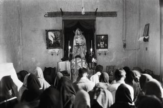 A clandestine Mass is celebrated in a safe house in Mexico City, circa 1927.