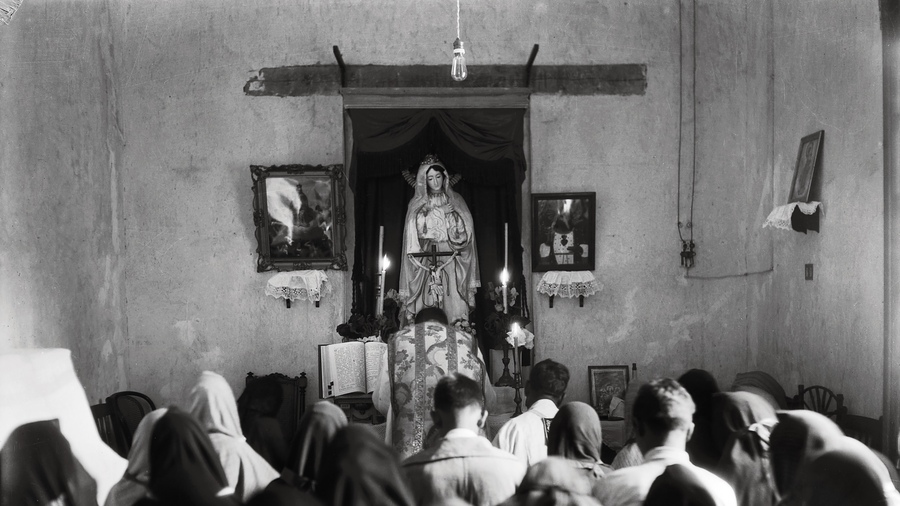 A clandestine Mass is celebrated in a safe house in Mexico City, circa 1927.