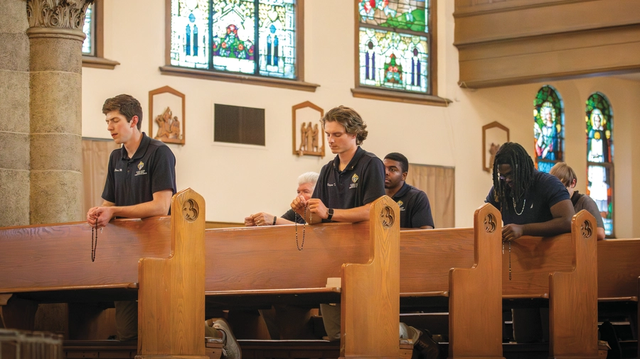 Members of St. Carlo Acutis Council 18672 in Detroit pray the rosary at Our Lady of the Rosary Church.(Photo by Jonathan Francis)