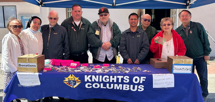 Members of Holy Angels Council 10948 in Colma, Calif., and fellow parishioners sell bracelets donated by Past State Deputy Greg Marracq and his wife after a Mass at Holy Angels Parish.